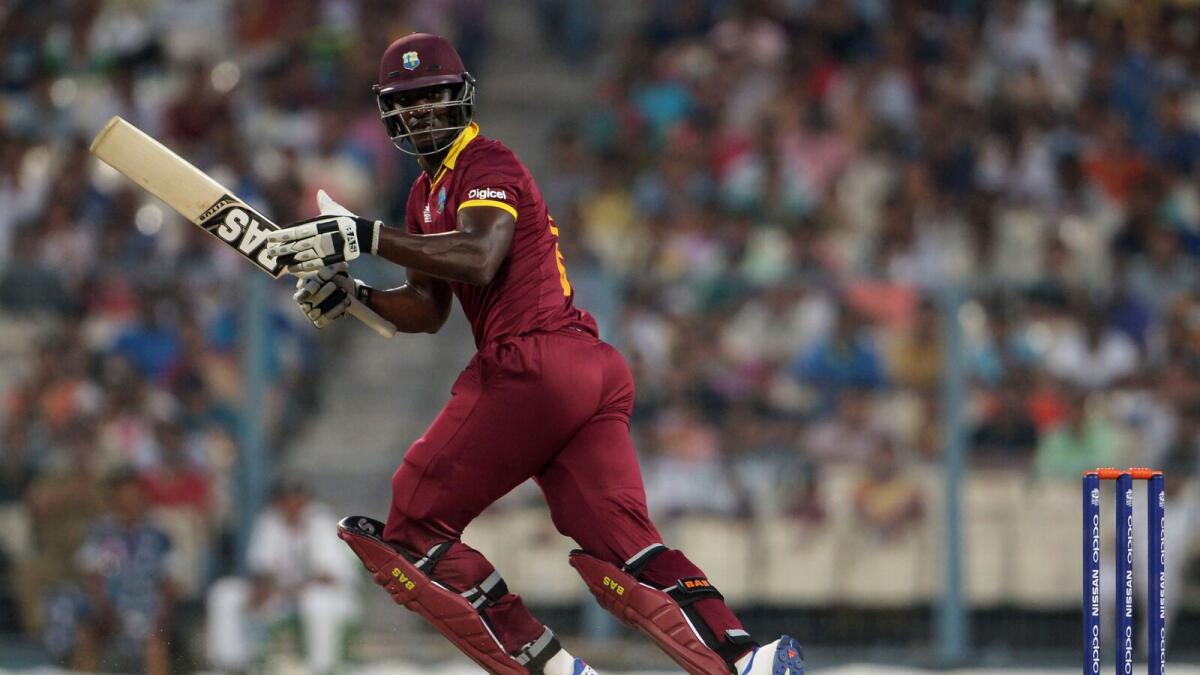 West Indies captain Darren Sammy on his way to a match-winning knock against Australia. — AFP
