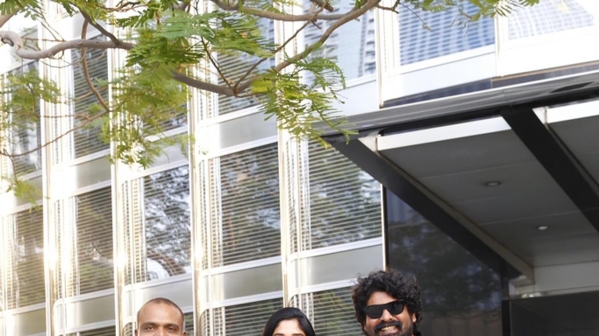 Nyla with her heavy-duty Porinju Mariam Jose co-stars Chemban Vinod and Joju George during the press conference at the Armani Hotel, Burj Khalifa
