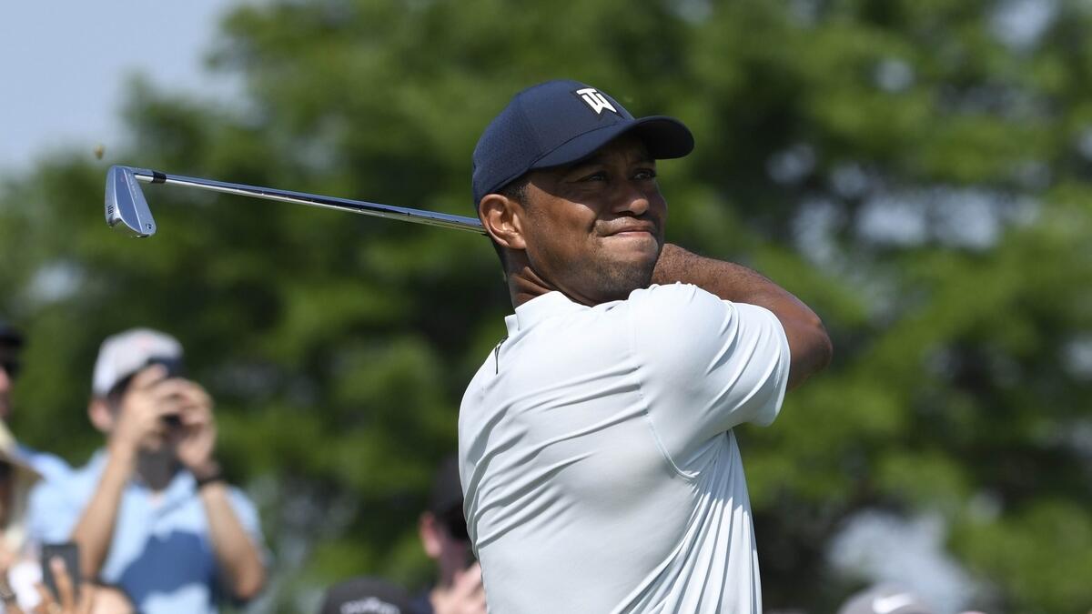 Woods withdraws from Northern Trust, citing oblique strain