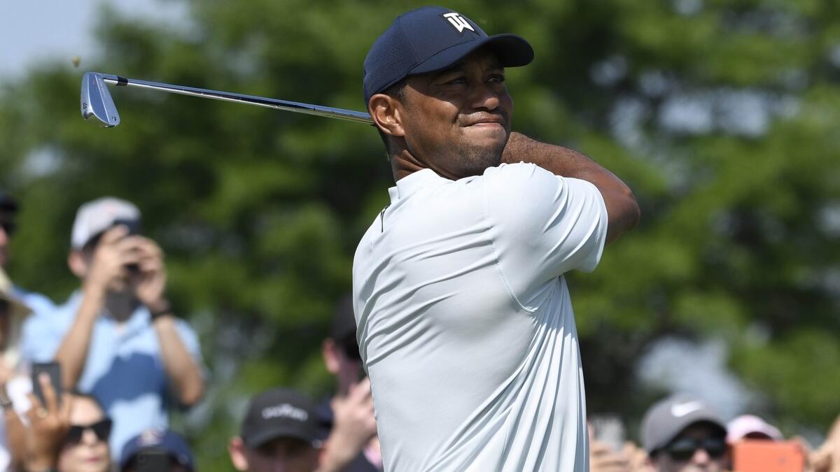 Woods withdraws from Northern Trust, citing oblique strain