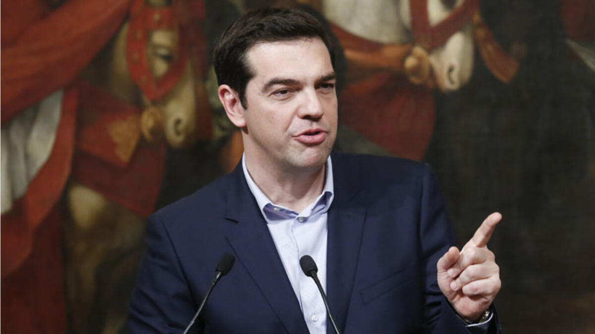 Greece reaches deal with creditors, avoids euro exit