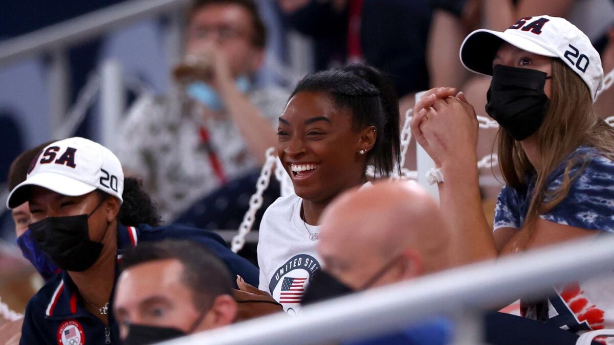 Simone Biles of the United States watches her teammates perform. — Reuters