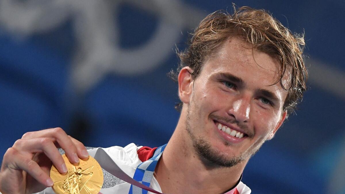 Gold medallist Alexander Zverev of Germany at the Tokyo Olympics men's singles tennis medal ceremony. (AFP)