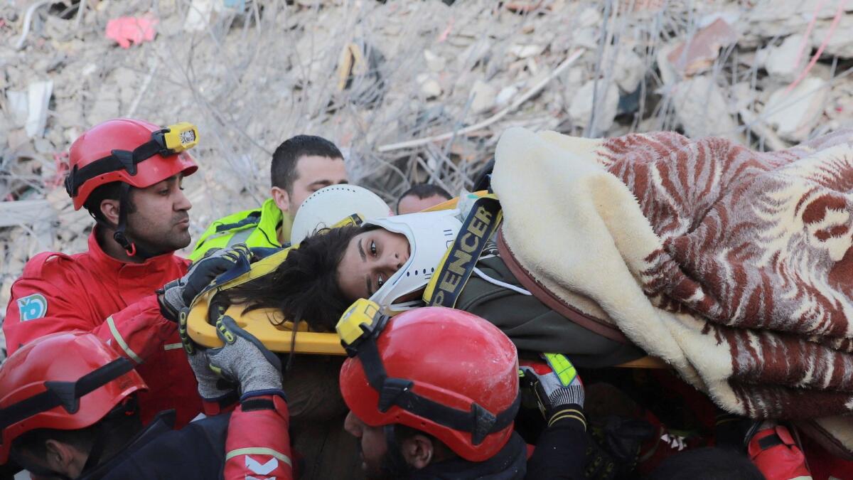 Gul, a 17-year old Turkish girl, is carried to an ambulance after being rescued alive from rubbles in the aftermath of a deadly earthquake in Iskenderun, Turkey February 8, 2023. REUTERS/Berkcan Zengin NO RESALES. NO ARCHIVES.
