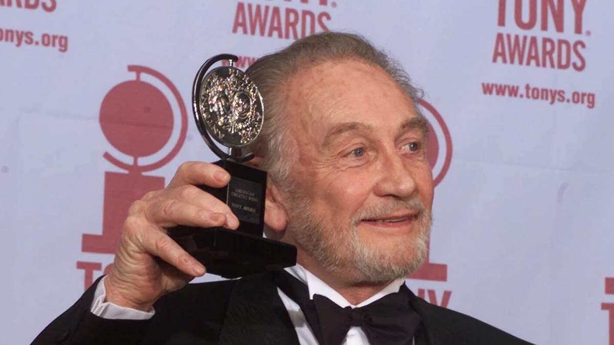 Roy Dotrice poses with his Tony award for Best Featured Actor