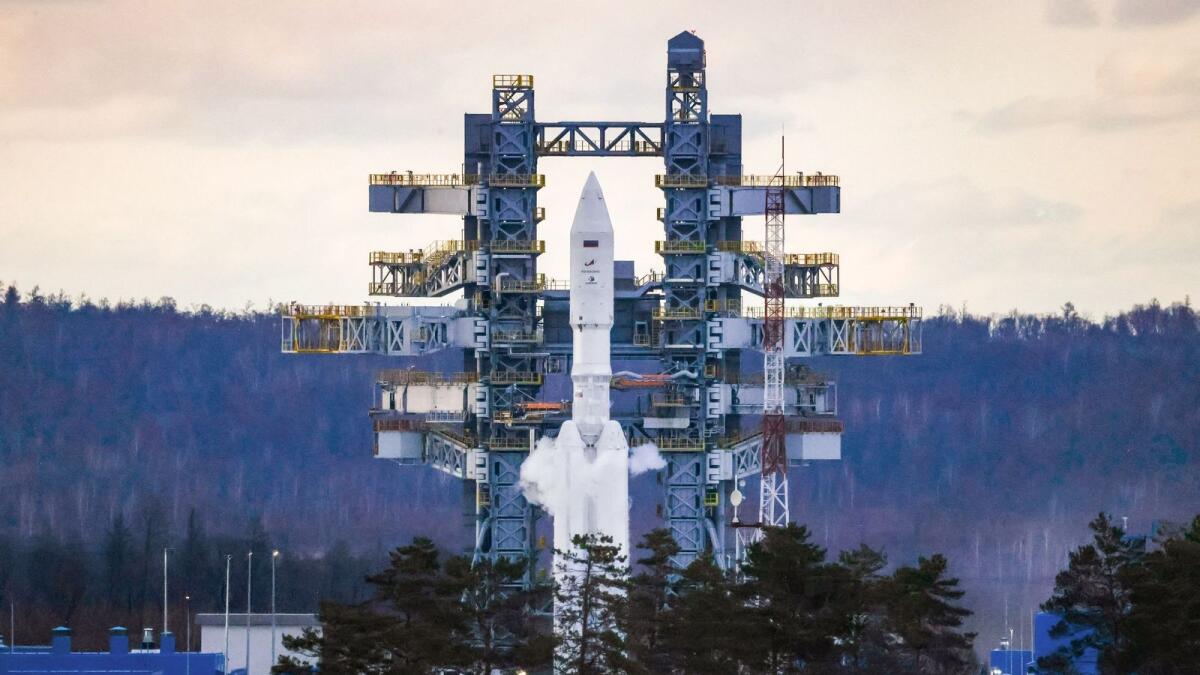 This handout picture released by the Russian Roscosmos space agency on April 10, 2024 shows a heavy-class Angara-A5 rocket at the launch pad of the Vostochny cosmodrome in the Amur region. The launch was cancelled and rescheduled for April 11, 2024 due to a technical malfunction.— AFP