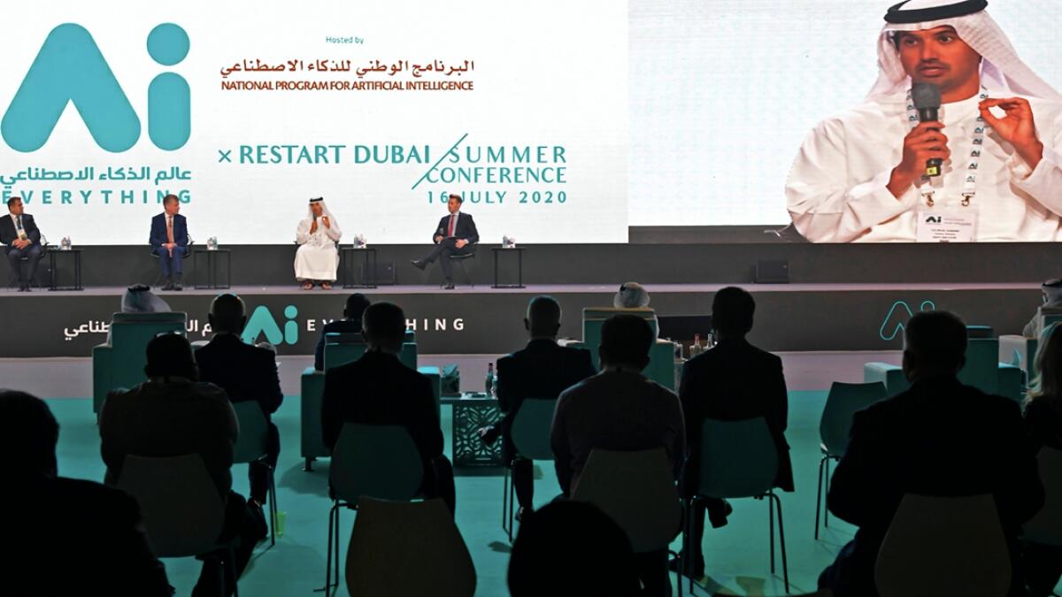 (Podium L to R) Boutros Boutros, Emirates' head of corporate communications, Dubai Airports CEO Paul Griffiths, and Director General of Dubai's Department of Tourism and Commerce Marketing (Dubai Tourism) Helal Saeed Al Marri, attend the Restart Dubai Summer Conference in the Gulf emirate of Dubai. Photo: AFP