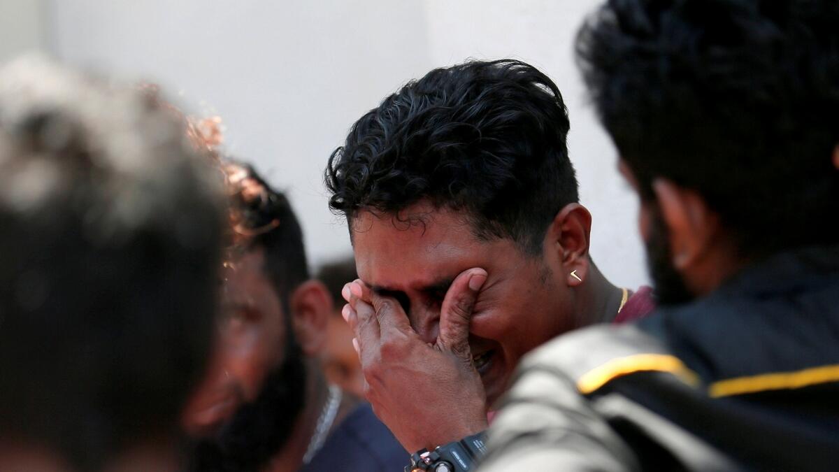 A relative of a victim of the explosion at St. Anthonys Shrine, Kochchikade church reacts at the police mortuary in Colombo. Reuters 
