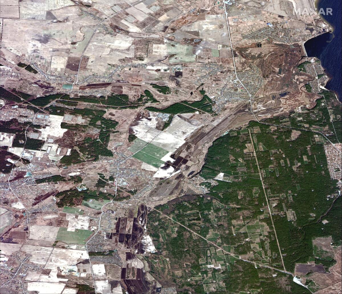 This Maxar satellite image taken on February 28, 2022 and released on March 22, 2022 shows an overview of fields and the Irpin River basin in Kozarovychi north of Kyiv, Ukraine. Photo: AFP