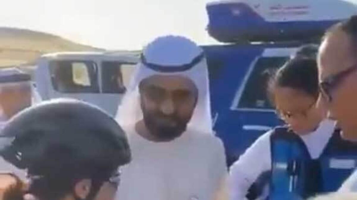 Video: Sheikh Mohammed helps cyclist after she falls during race in Dubai