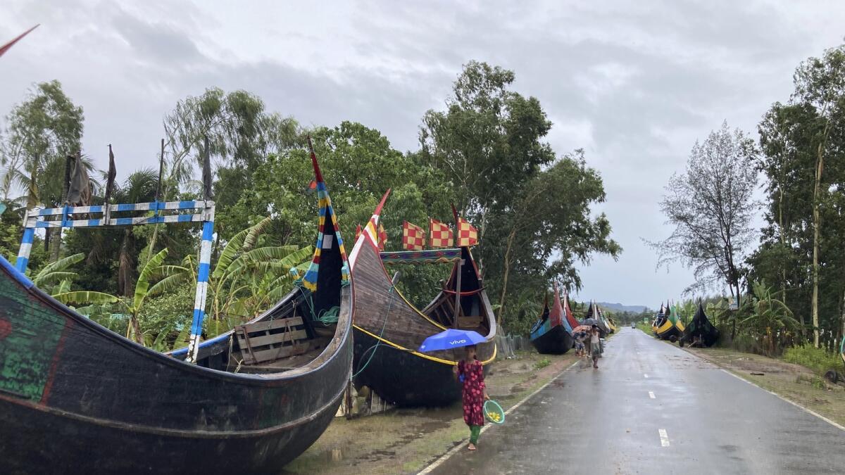 Boats are parked along a road near the coast in Cox's Bazar district, Bangladesh. — AP