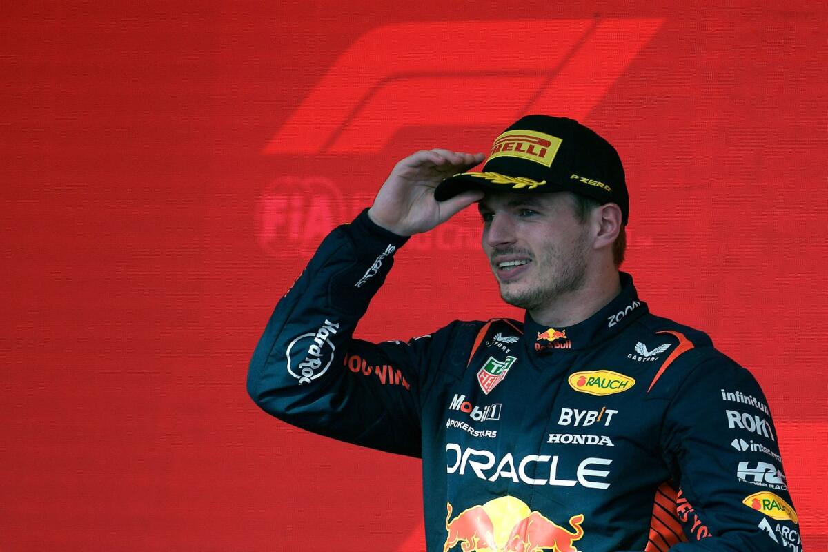 Red Bull Racing's Dutch driver Max Verstappen celebrates on the podium. — AFP