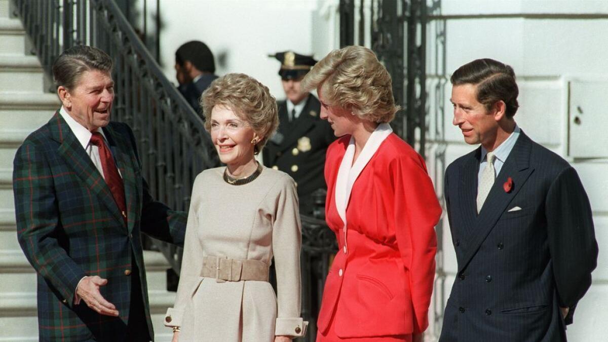 (L-R) US President Ronald Reagan and US First Lady Nancy Reagan welcoming to the White House Princess Diana and her husband Prince Charles. –AFP file photo