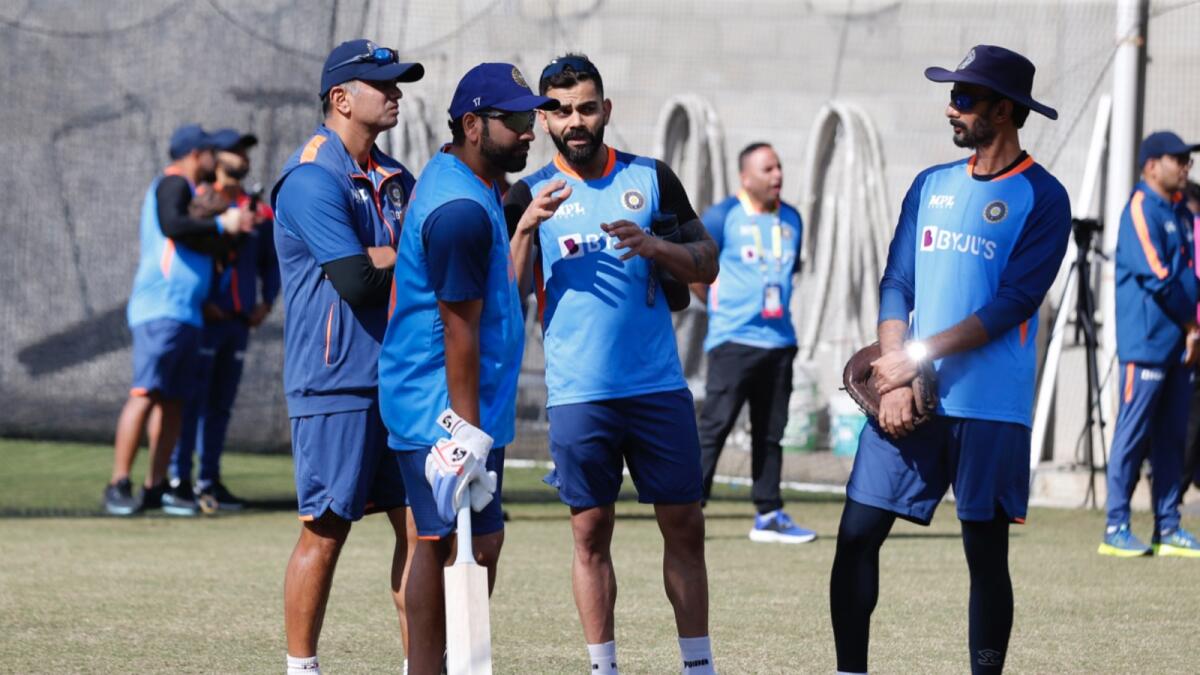 Indian captain Rohit Sharma (second from left) with coach Rahul Dravid, Virat Kohli and batting coach Vikram Rathour during a practice session in Melbourne on Saturday. — BCCI