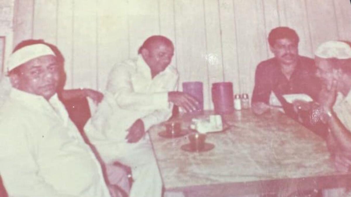 Abubakr Motai with his friends at Al Hamra restaurant