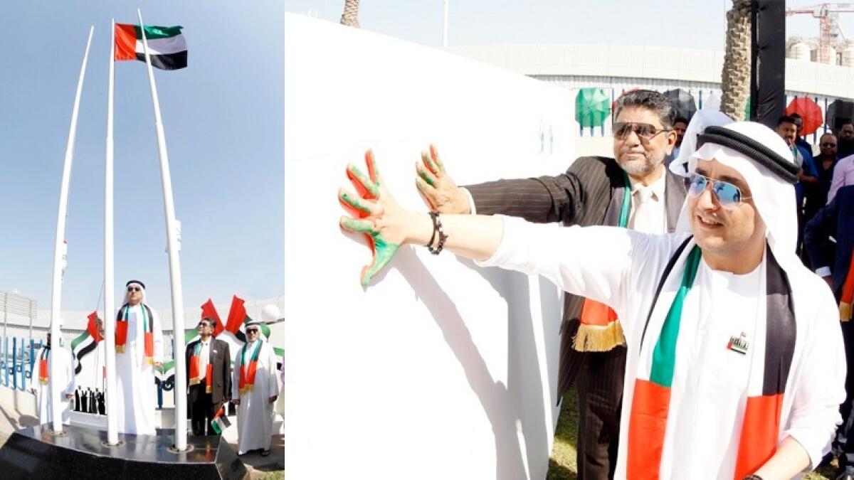 Galadari staff come together to salute the UAE flag