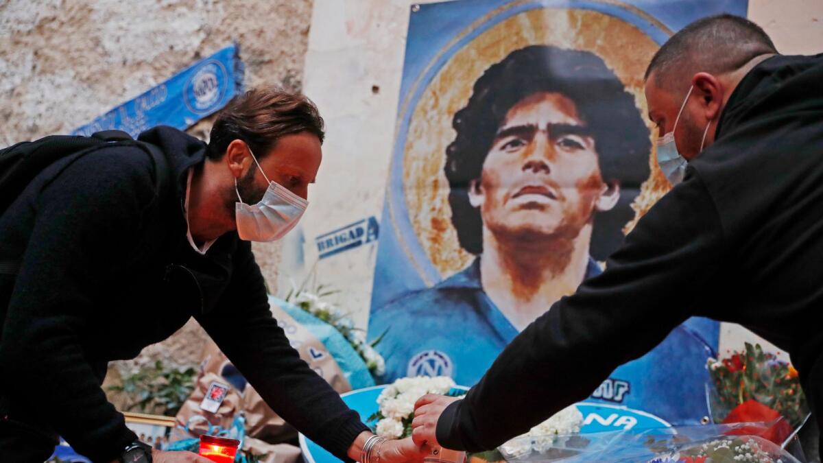 People mourn the death of Argentine soccer legend Diego Maradona, Naples, Italy - November 26, 2020