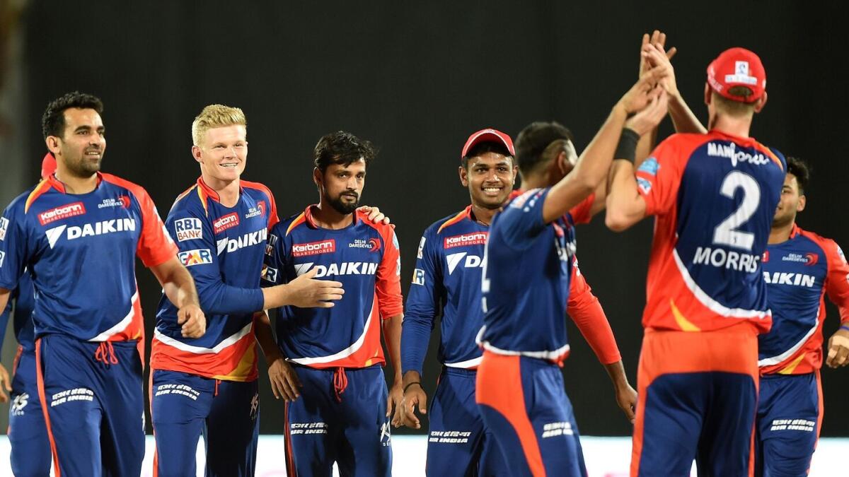 Delhi Daredevils bowler Shahbaz Nadeem (3L) celebrates with teammates after taking the wicket of Gujarat Lions batsman Dwayne Smith during the 2016 Indian Premier League (IPL) Twenty20 cricket match between Gujarat Lions and Delhi Daredevils at The Saurashtra Cricket Association Stadium in Rajkot on May 3, 2016.     GETTYOUT/ ----IMAGE RESTRICTED TO EDITORIAL USE - STRICTLY NO COMMERCIAL USE-----  GETTYOUT/ / AFP / PUNIT PARANJPE