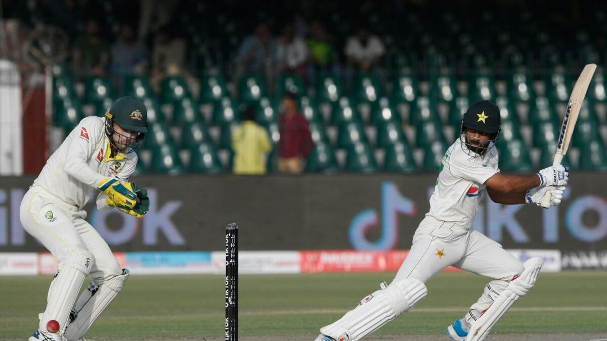Pakistan's Abdullah Shafique (right) plays a shot during the second day of the third Test against Australia in Lahore. (AFP)