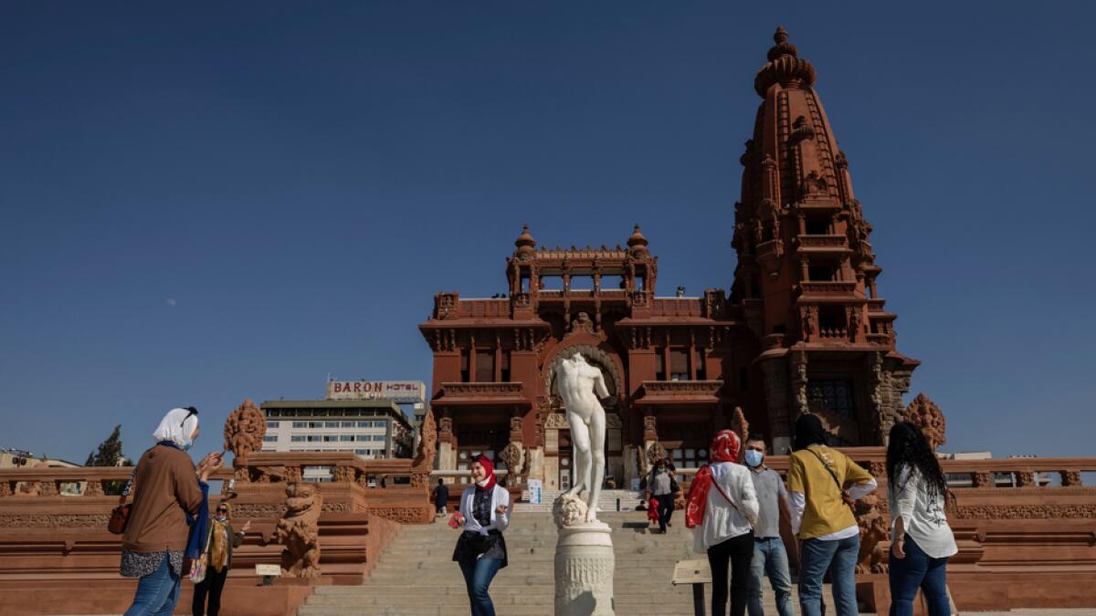 People tour the Baron Empain Palace, during the opening after its reconstruction in Heliopolis, Cairo, Egypt. Photo: AP