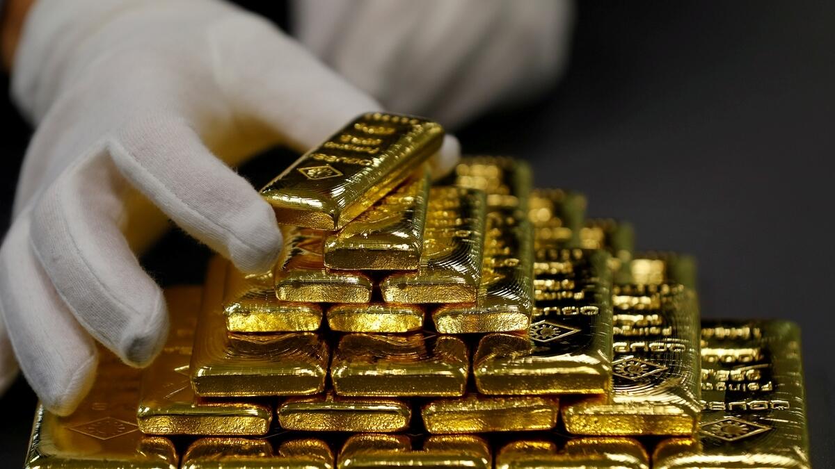 Gold price eases as dollar firms