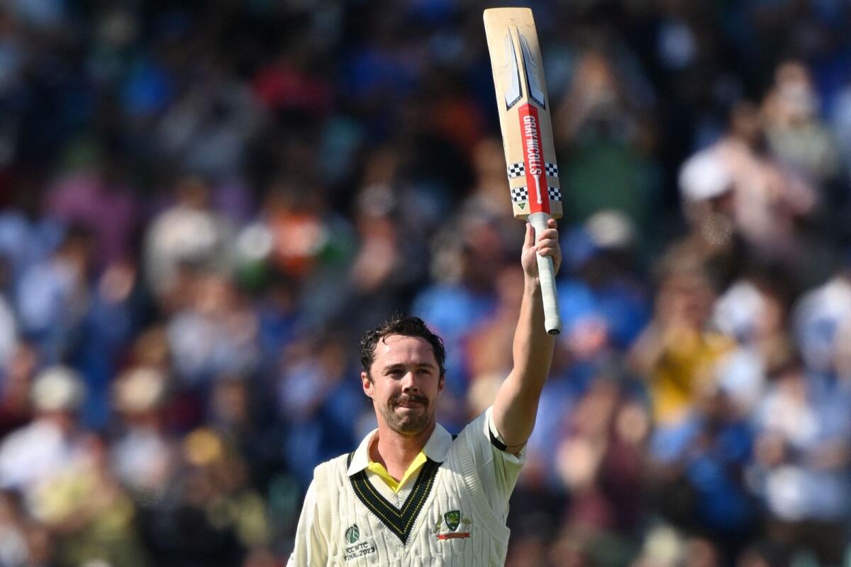 Australia's Travis Head celebrates his century. — AFP