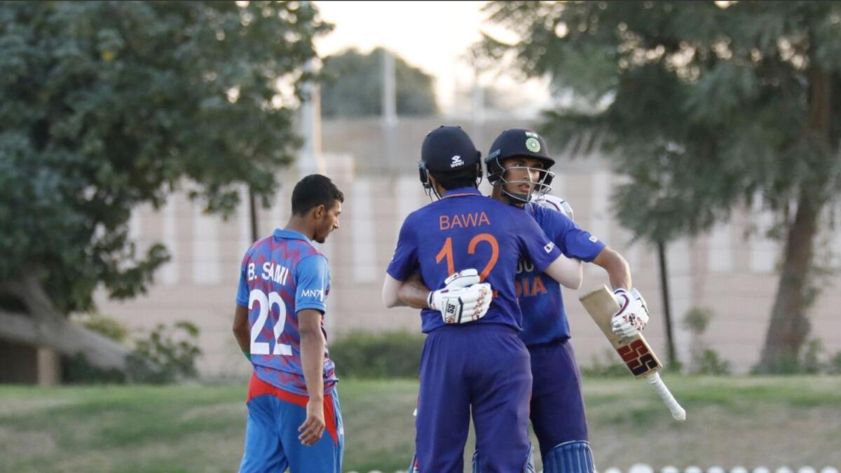 India’s Raj Bawa and Kaushal Tambe celebrate their win over Afghanistan in Dubai on Monday. (Asian Cricket Council Twitter)