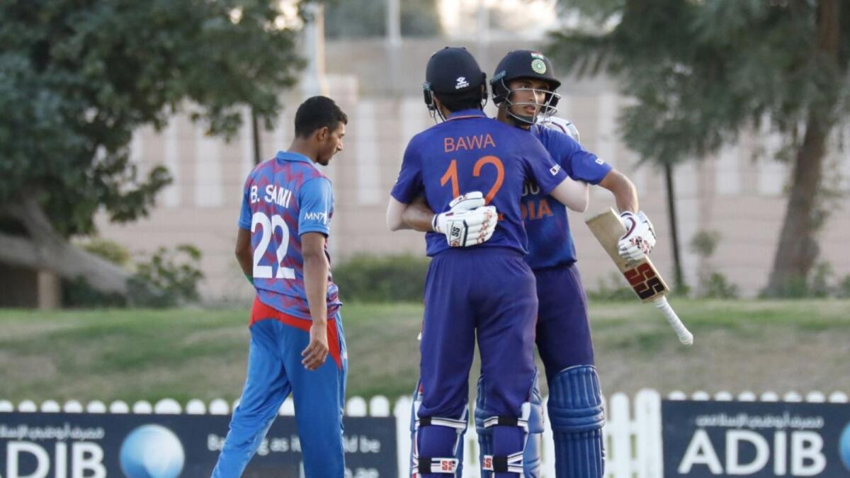 India’s Raj Bawa and Kaushal Tambe celebrate their win over Afghanistan in Dubai on Monday. (Asian Cricket Council Twitter)