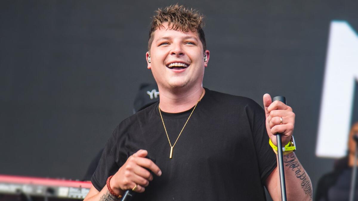 LIVERPOOL, ENGLAND - AUGUST 31:  John Newman performs on stage during day 2 of Fusion Festival 2019 on August 31, 2019 in Liverpool, England.  (Photo by Joseph Okpako/WireImage)