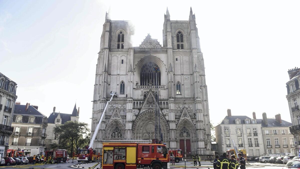 Firefighters are at work to put out a fire at the Saint-Pierre-et-Saint-Paul cathedral in Nantes, western France. The major fire that broke out on July 18, 2020 inside the cathedral in the western French city of Nantes has now been contained, emergency services said. 'It is a major fire,' the emergency operations centre said, adding that crews were alerted just before 8am (0600 GMT) and that 60 firefighters had been dispatched. - AFP&lt;p&gt;&lt;/p&gt; &lt;p&gt;&lt;/p&gt;Research: Fakhar Ul Islam/Khaleej Times