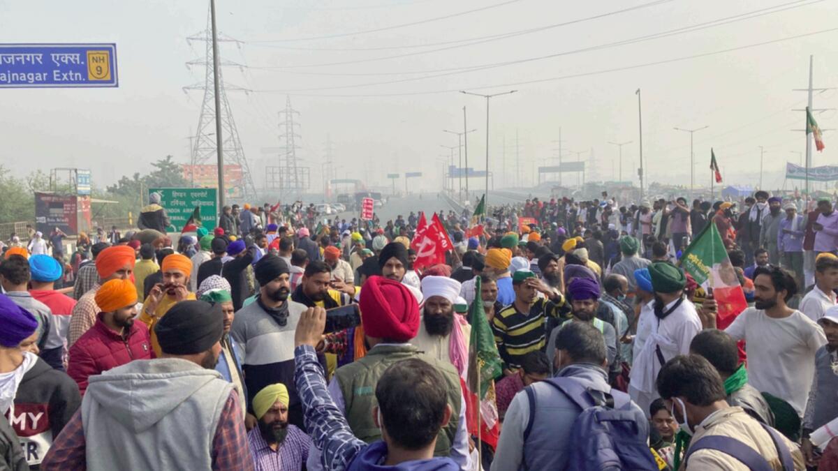 Protestors block a highway during a strike in New Delhi. — AP