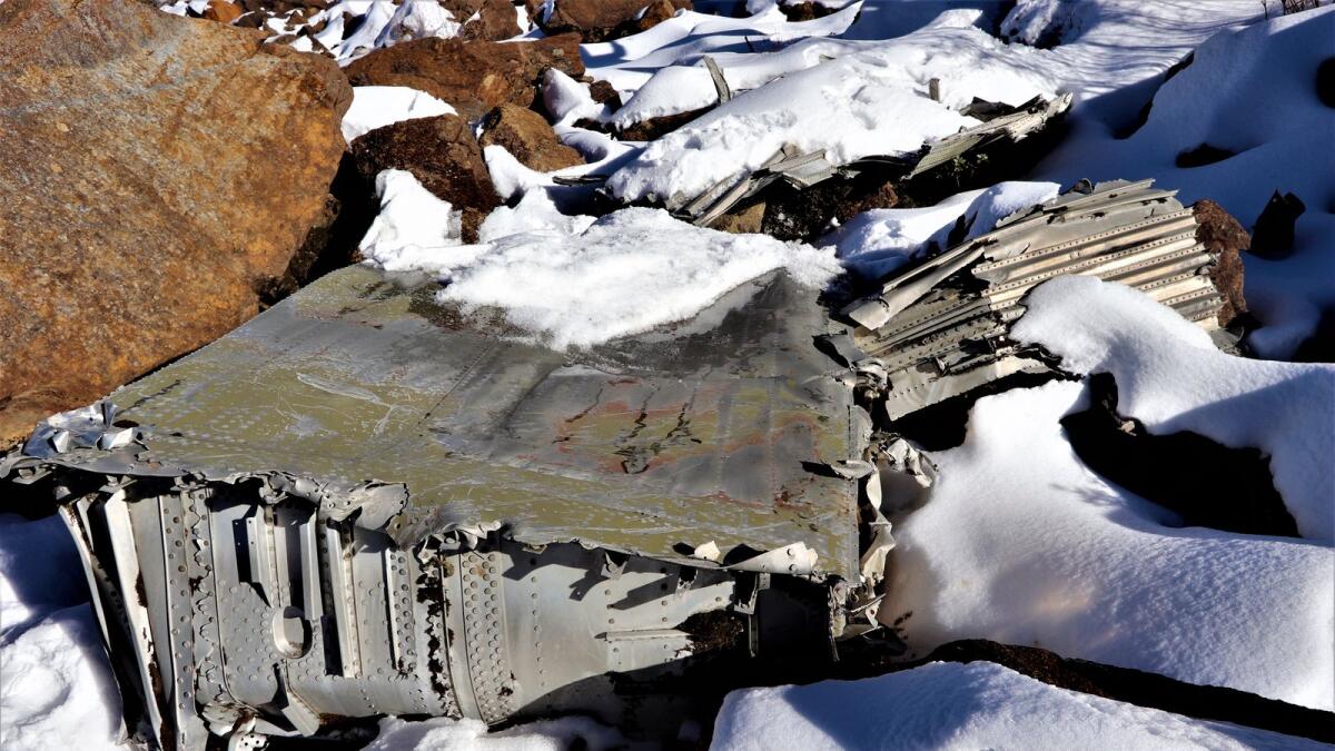 The wreckage of World War II C-46 aircraft on a snow-covered mountain side in the northeastern state of Arunachal Pradesh in India. — AFP/MIA Recoveries