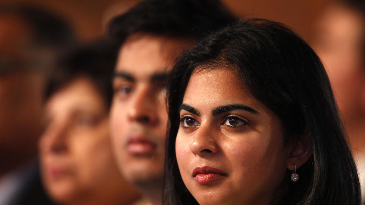 NEW DELHI, INDIA - JULY 1: Reliance Industries Chairman Mukesh Ambani's  son Akash Ambani and daughter Isha Ambani attend the launch of Digital India Week by Prime Minister Narendra Modi at IGI Stadium on July 1, 2015 in New Delhi, India. The Digital India Week which is part of the $18 billion campaign to provide fast internet connections for all and is aimed at popularising Prime Minister Narendra Modi's campaign promise to connect 250,000 villages in India by 2019. (Photo by Ajay Aggarwal/Hindustan Times via Getty Images)