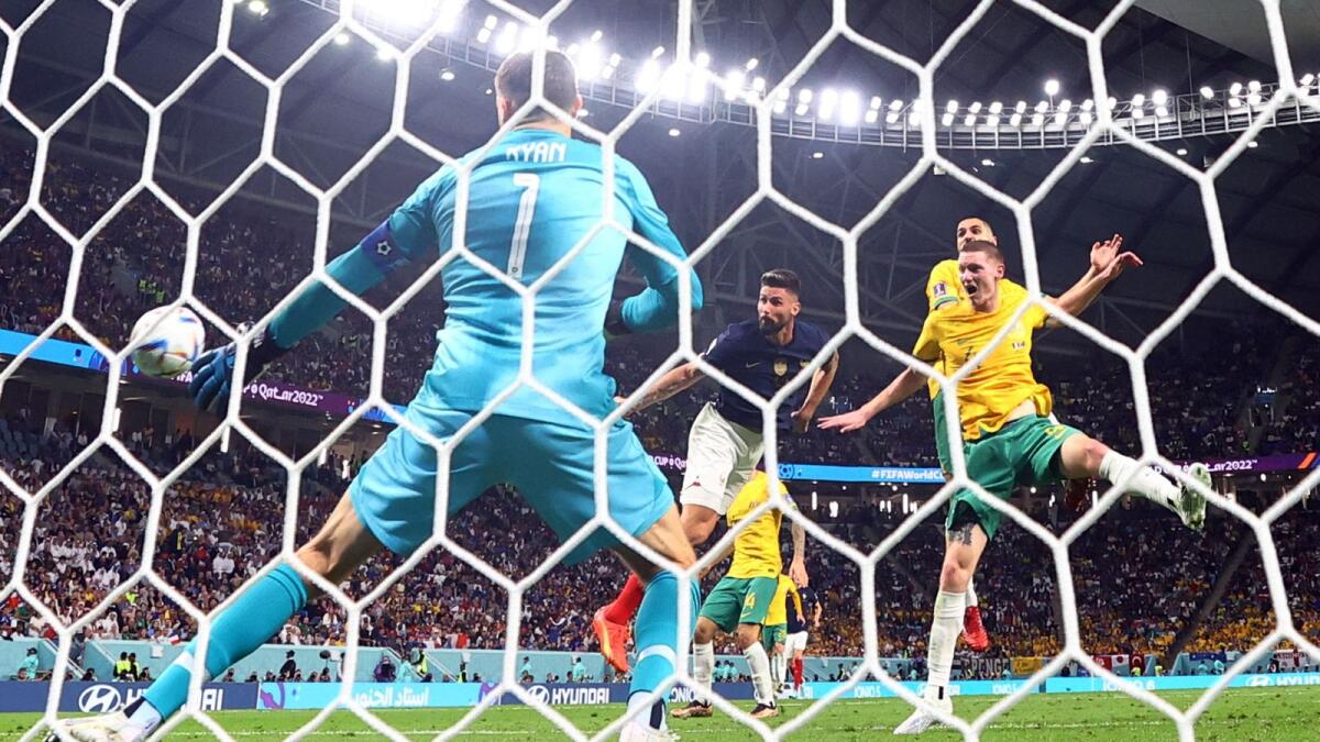 France's Olivier Giroud scores their fourth goal against Australia. — Reuters