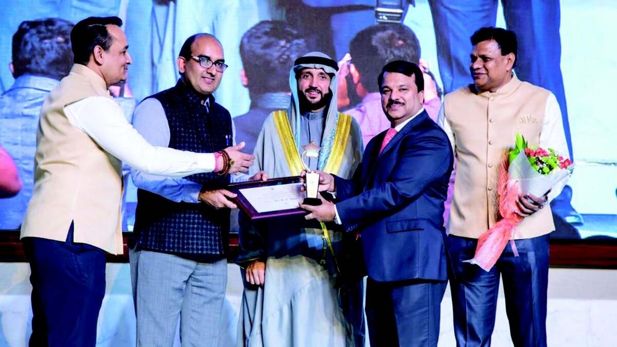 Dr Hussain receiving award from Government of India (Ministry of External Affairs)