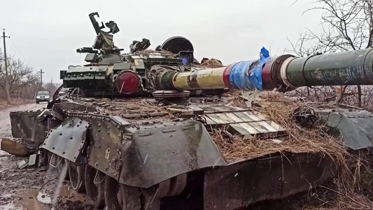 This screen grab obtained from a handout video released by the Russian Defence Ministry on March 4, 2022, shows a destroyed Ukrainian army tank in the settlement of Gnutovo outside Mariupol. Photo: AFP