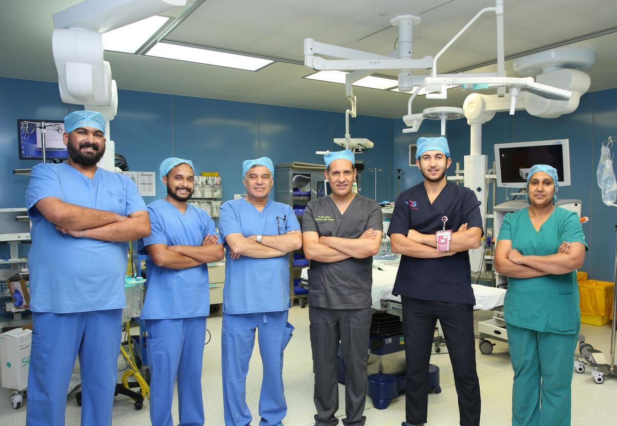 Dr. Firas M. Husban (third from right) along with the medical team after the surgery