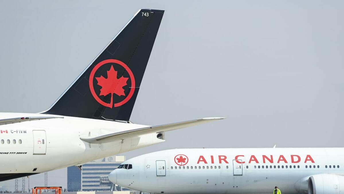Air Canada planes sit on the tarmac at Pearson International Airport in Toronto. The airline is set to further increase its Dubai to Toronto service from five to six times weekly from January 8, 2023 and then to daily from March 26, 2023. — File photo