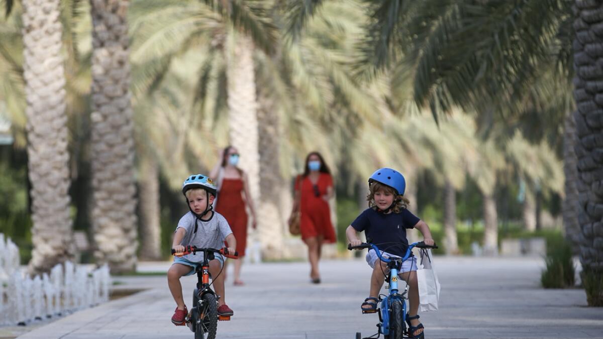 Residents stroll at  Umm Al Emarat Park in Abu Dhabi. Photo: Ryan Lim/Khaleej Times