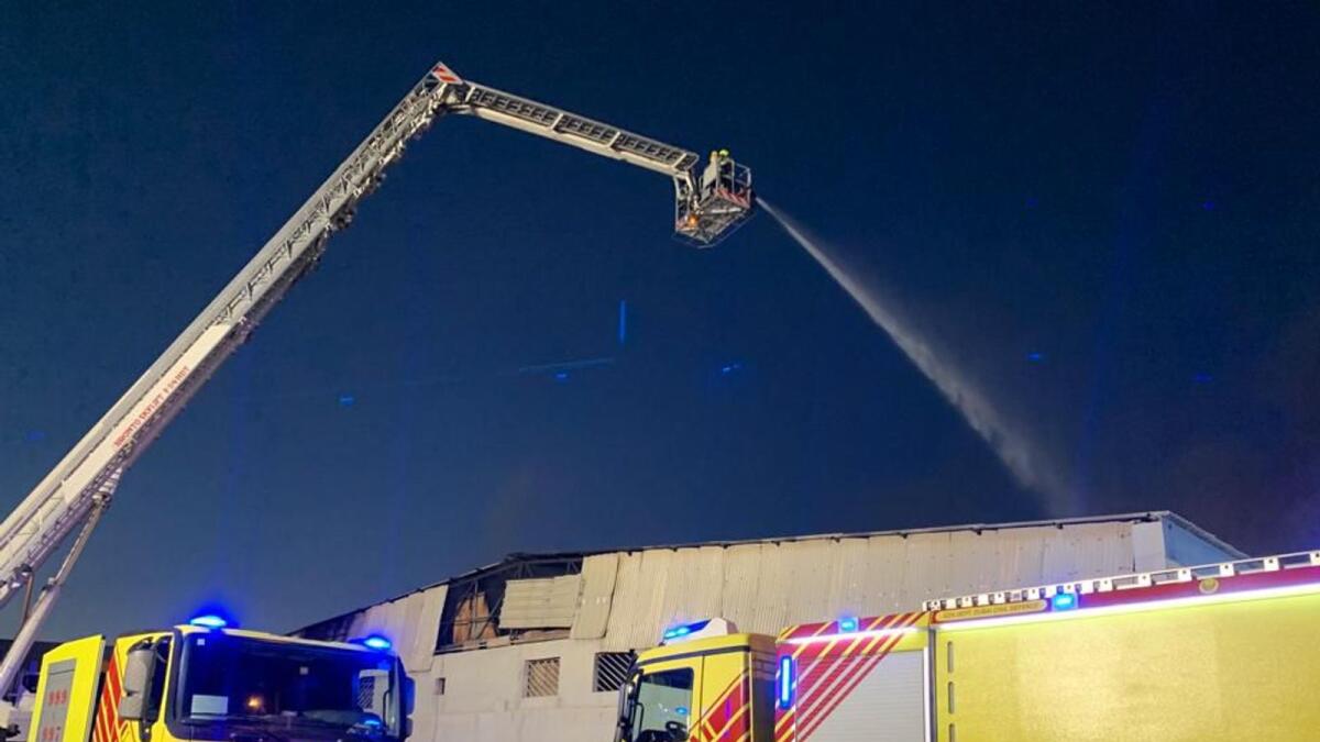 Firefighters put out a fire in Ras Al Khor industrial area in Dubai on Saturday. — Supplied photo