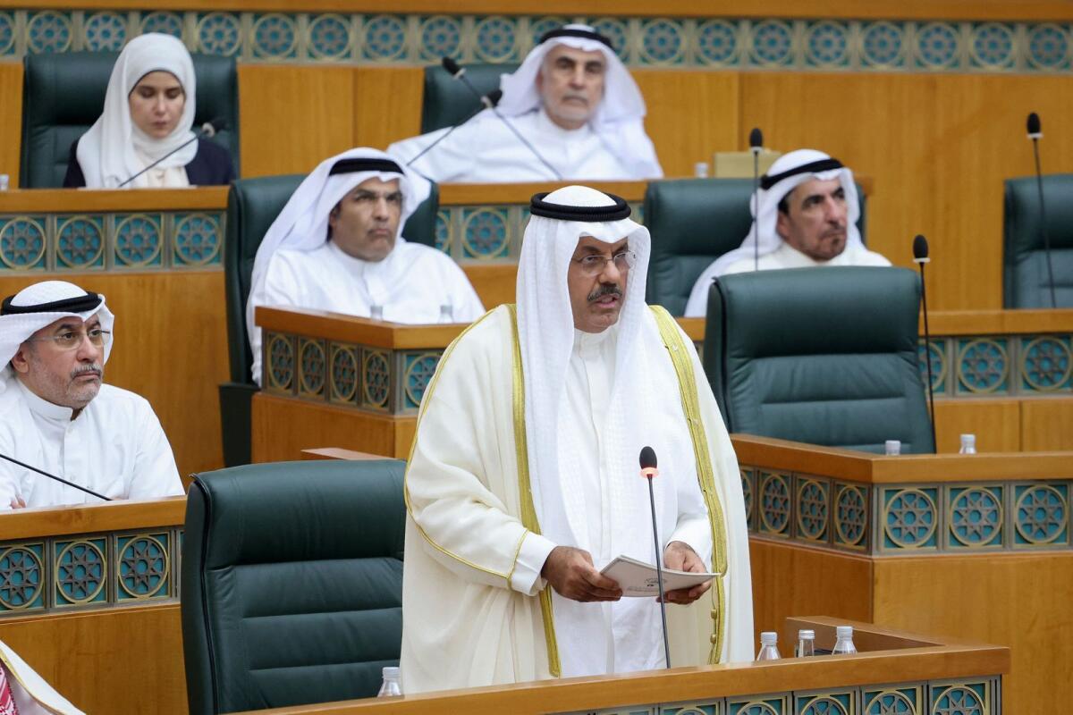 Kuwait's Prime Minister Sheikh Ahmad Al Nawaf Al Sabah speaks during a parliament session at the national assembly in Kuwait City on August 2. — AFP file