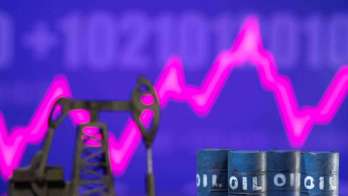 Models of oil barrels and a pump jack are displayed in front of a rising stock graph and '$100' in this illustration. Brent crude futures were up 71 cents, or 0.79 per cent, at$90.54 per barrel by 1408GMT, after rising by more than $2 earlier in the session. — Reuters