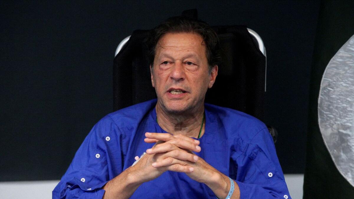 Imran Khan addresses a news conference after he was wounded following a shooting incident during a long march in Wazirabad. — Reuters file