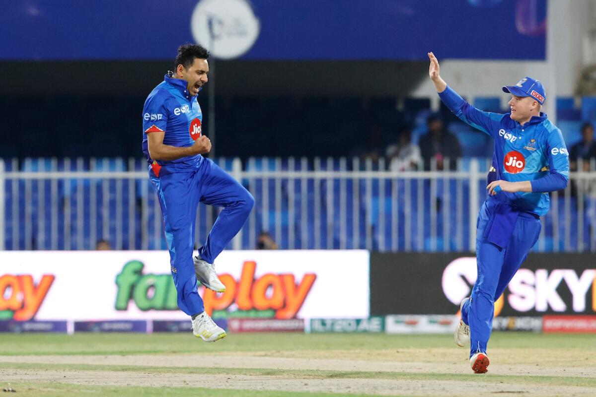 Zahoor Khan (left) of MI Emirates celebrates the wicket of Sam Billings of Desert Vipers at the Sharjah Cricket Stadium on Sunday. — Supplied photo