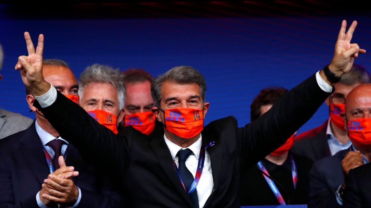 Joan Laporta celebrates his victory after elections at the Camp Nou stadium in Barcelona. — AP