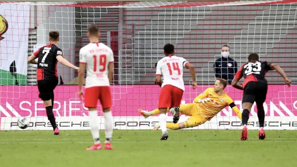 Hertha Berlin's Krzysztof Piatek scores their second goal from the penalty spot against RB Leipzig on Wednesday. - Reuters