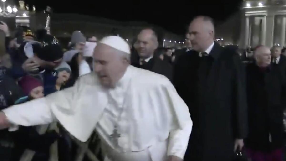 pope francis, vatican, happy new year, viral video, pope slaps womans hand