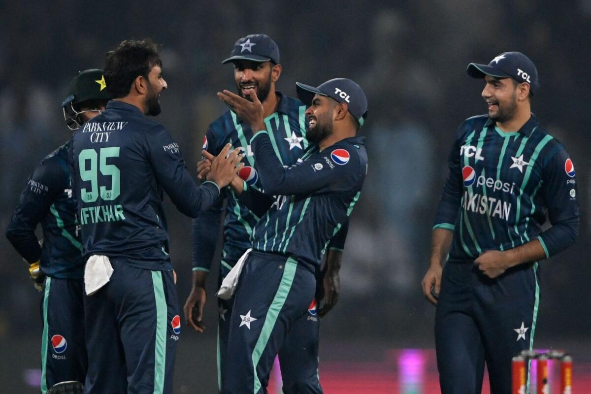 Pakistan players celebrate after the dismissal of England's Dawid Malan. (AFP)