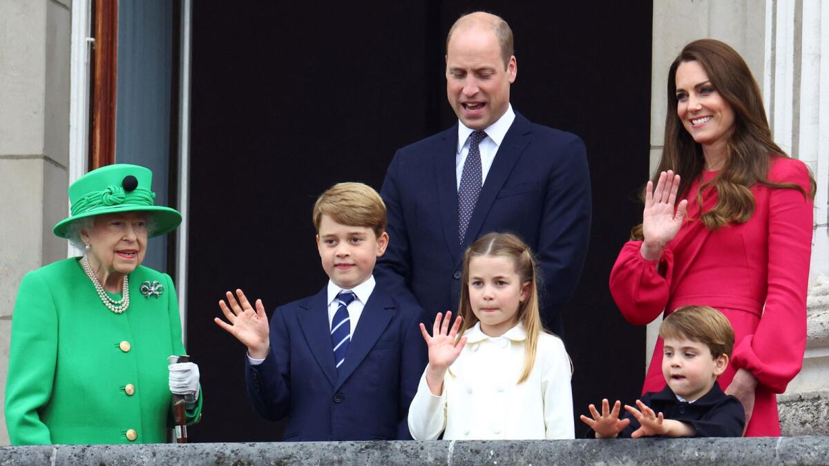 Britain's Queen Elizabeth II (L) along with Prince George, Princess Charlotte, Prince Louis, Prince William, and Catherine, Duchess of Cambridge. Photo: AFP