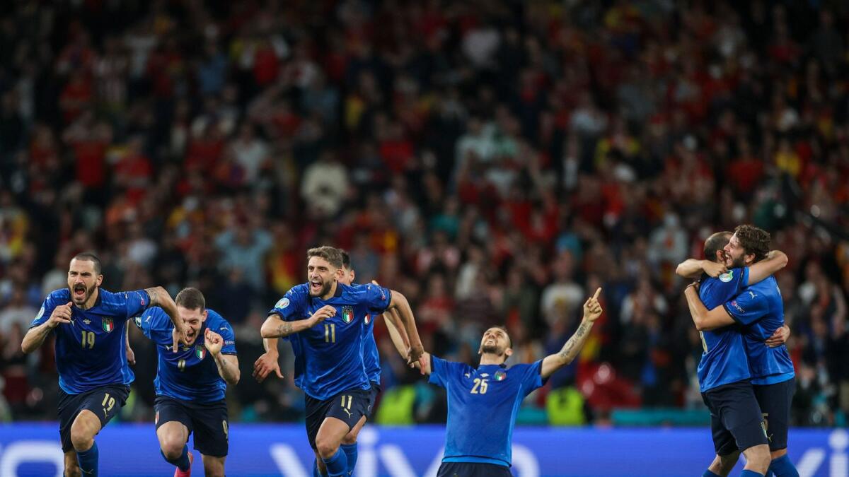 Italy players celebrate after winning the Euro 2020 semifinal against Spain at Wembley Stadium. — AP